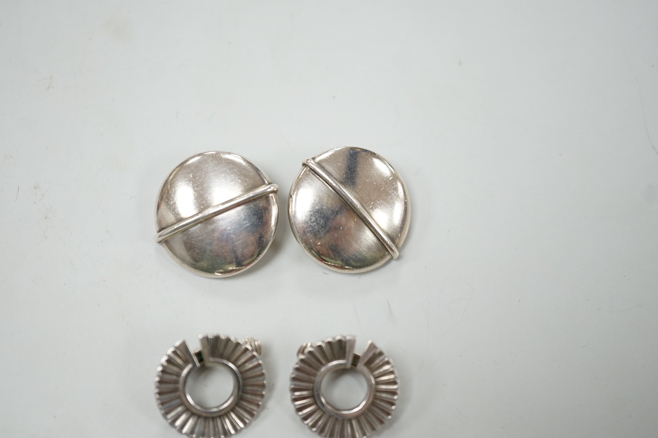 Two pairs of Georg Jensen sterling ear clips, design no. 232, 24mm and no. 92, with one Jensen box.